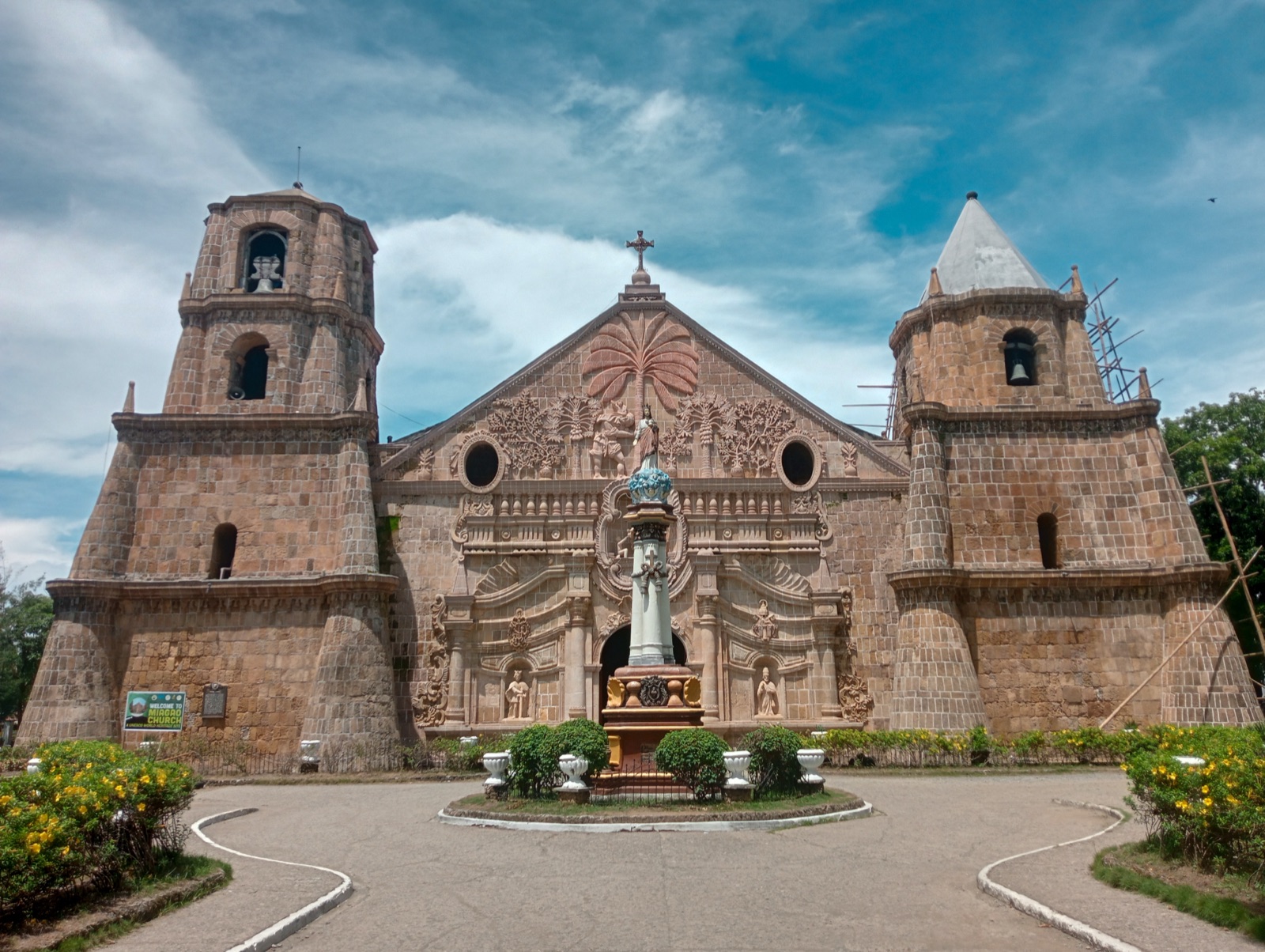The carved baroque façade and twin bell towers of Miagao Church in Iloilo, a UNESCO World Heritage site